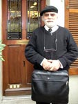 The Travelling-Desk&reg; carried in a black leather case